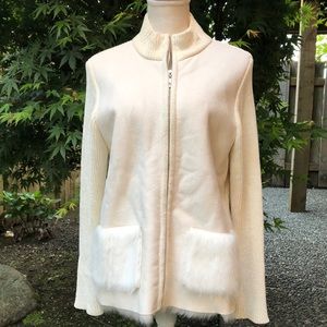 Women’s zip up cream sweater.